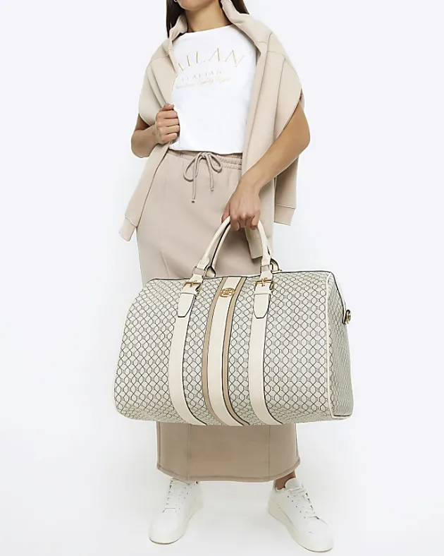 River Island Beige RI monogram travel bag< Bags, Purses & Luggage