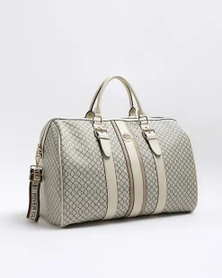 River Island Beige RI monogram travel bag< Bags, Purses & Luggage