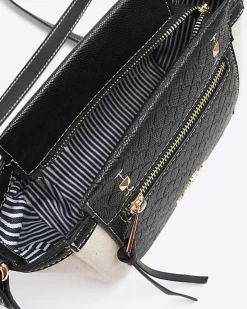 River Island canvas embossed RI cross body bag< Bags, Purses & Luggage