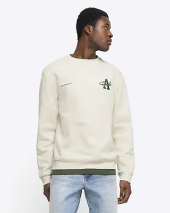 River Island Ecru regular fit graphic Aperton sweatshirt< Hoodies & Sweatshirts