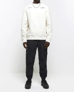 River Island Ecru regular fit graphic patch sweatshirt< Hoodies & Sweatshirts
