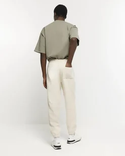 River Island Ecru regular fit rib panel joggers< Tracksuits