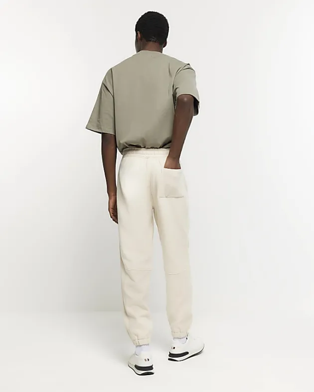 River Island Ecru regular fit rib panel joggers< Tracksuits