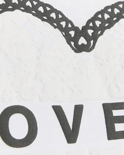 River Island Girls embossed cropped graphic t-shirt< Tops & T-shirts