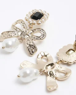 River Island Gold pearl bow drop earrings< Jewellery