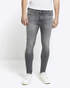 River Island super skinny spray on faded jeans< Jeans
