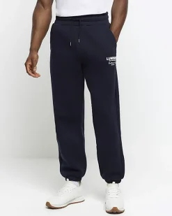 River Island Regular Fit Graphic tracksuit Joggers< Tracksuits