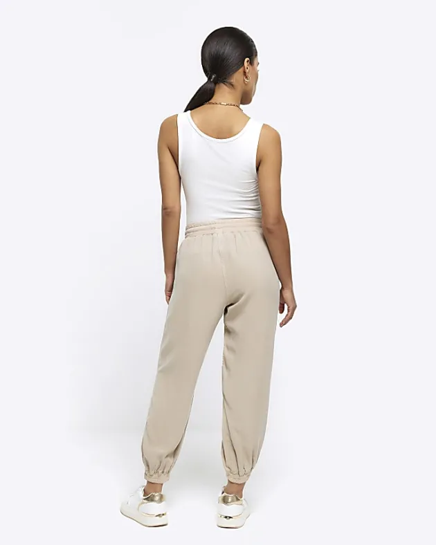 River Island Petite beige lyocell elasticated joggers< Petite
