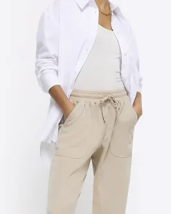 River Island Petite beige lyocell elasticated joggers< Petite