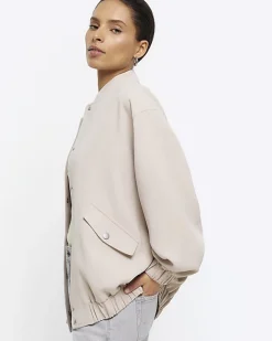 River Island Petite beige oversized bomber jacket< Petite