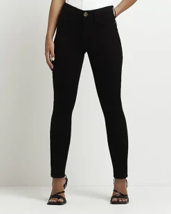 River Island Petite Molly mid rise skinny jeans< Petite