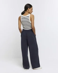 River Island Petite Navy wide leg lyocell trousers< Trousers