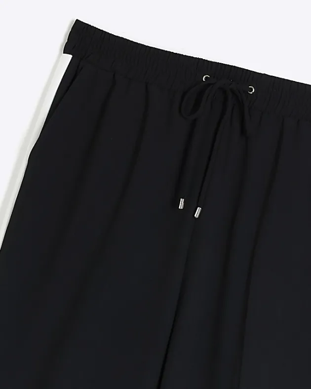 River Island Plus side stripe wide leg joggers< Plus